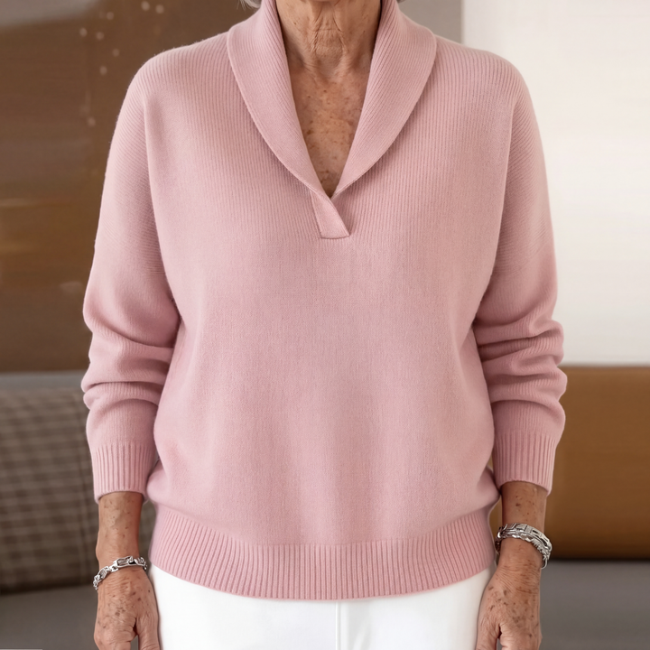 Soft pink relaxed fit v neck sweater with ribbed cuffs and hem