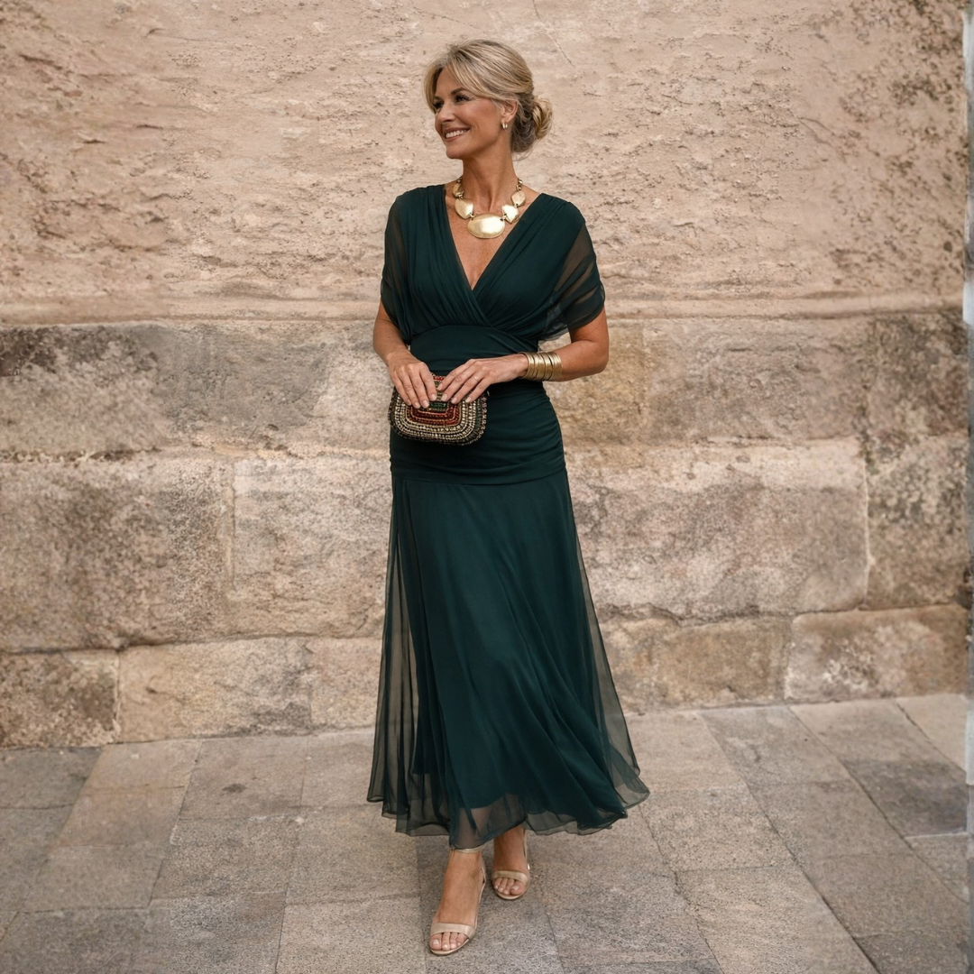 Women's emerald wedding guest dress, off shoulder ruched maxi, front view