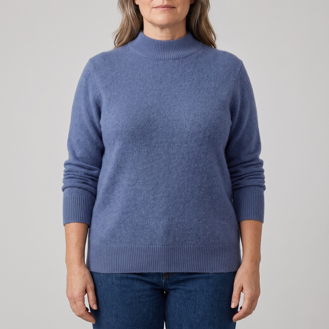 Women's mock neck sweater in blue with a relaxed fine knit fit, front view