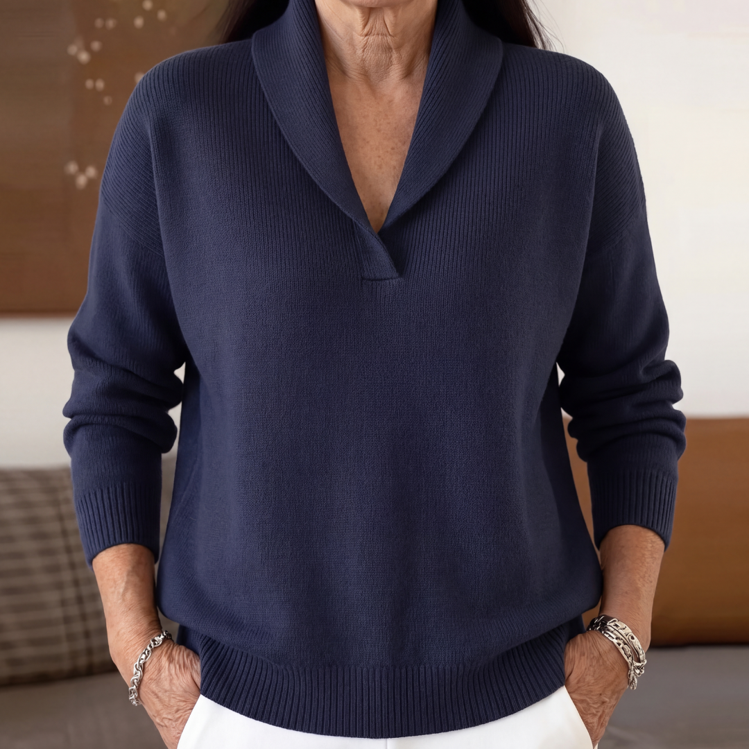 Navy shawl collar sweater with a v neckline and relaxed long sleeves