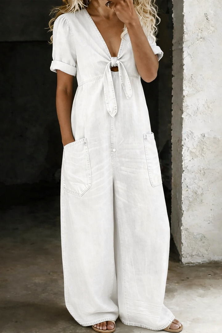 White V neck jumpsuit with wide legs and short sleeves, front view