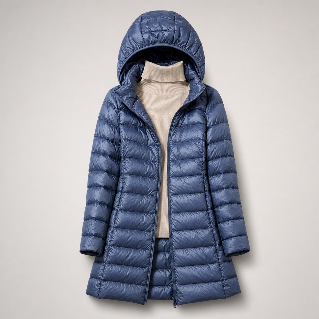 Blue lightweight hooded puffer coat worn open over a cream sweater