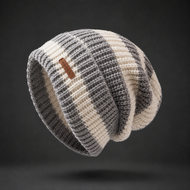 Gray and cream striped slouchy knit beanie with brown label