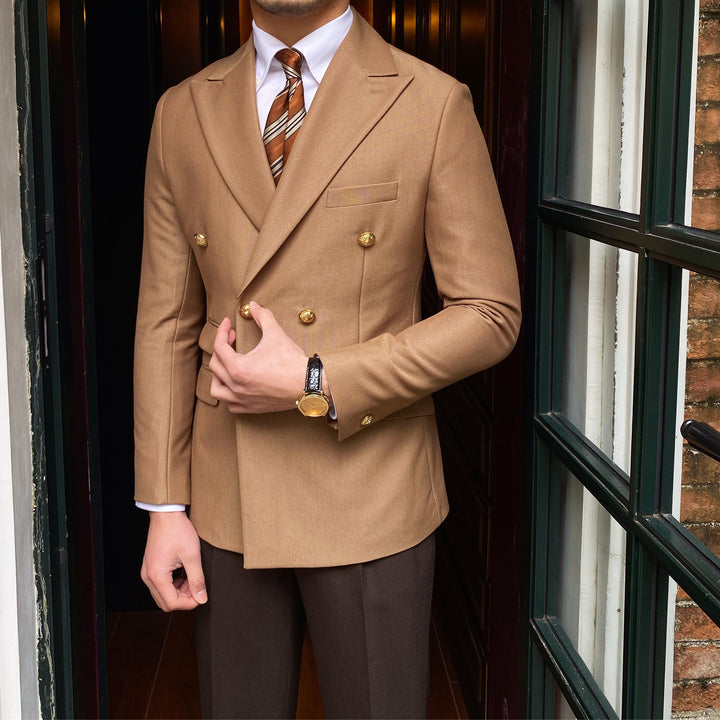 Camel blazer buttoned with gold-tone buttons and a wristwatch