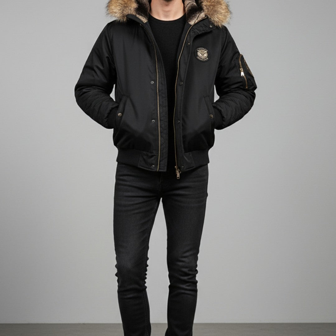 Man wearing the black bomber with the hood folded back