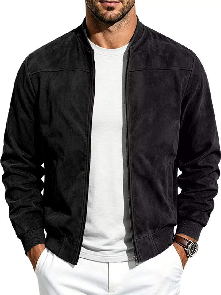 Black suede-look bomber jacket worn open with a white tee