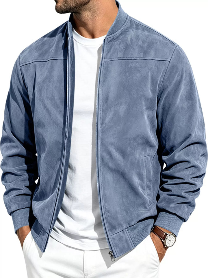 Light blue bomber worn open with hands in pockets