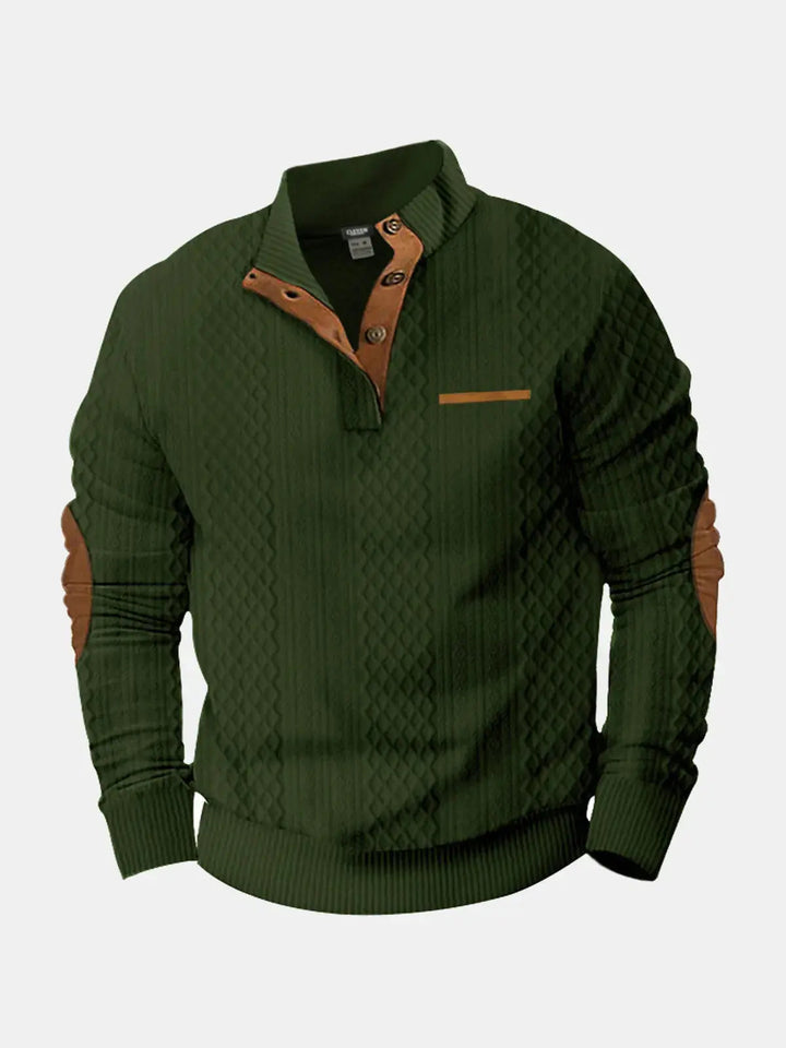 Dark green cable knit mock neck pullover with brown elbow patches, flat front view