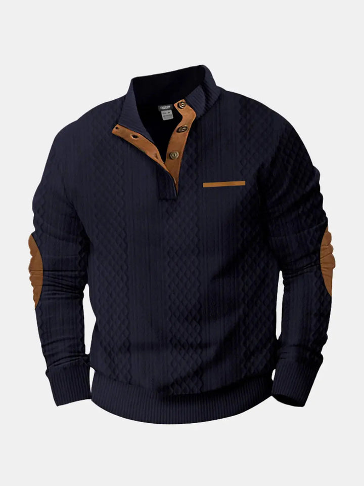 Navy cable knit mock neck pullover with brown elbow patches, flat front view