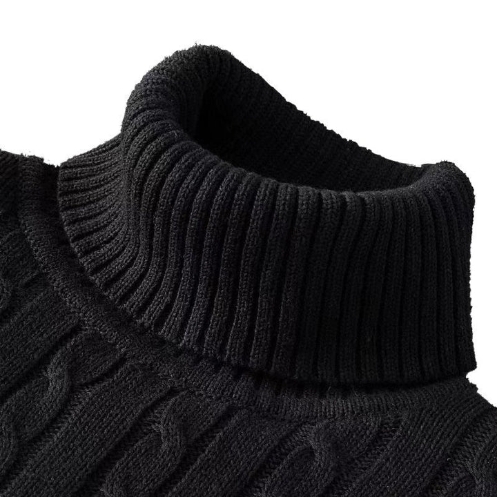 Close up of the black folded turtleneck and cable texture