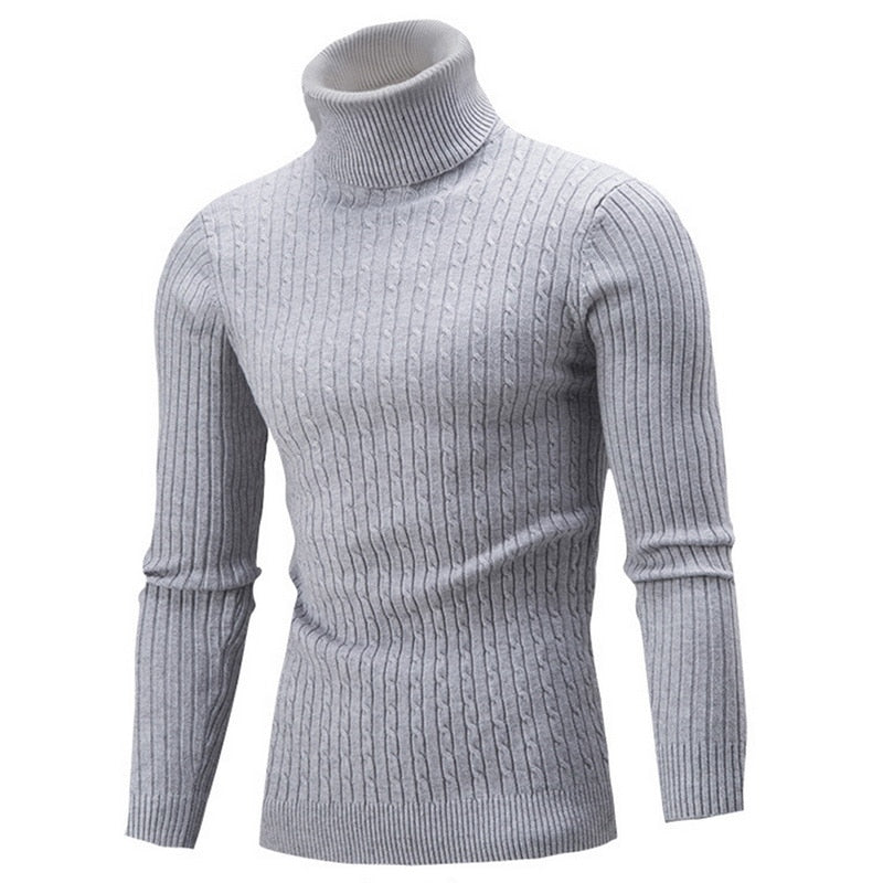 Light gray cable knit turtleneck sweater shown from the front