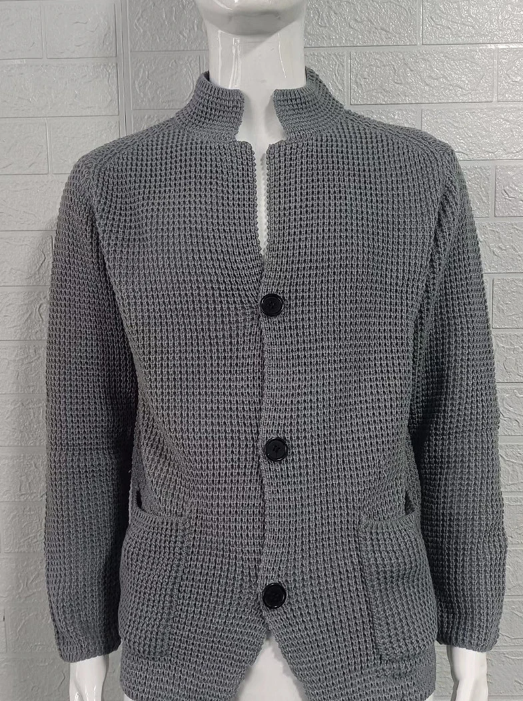 Gray knit cardigan with three buttons and front pockets on a mannequin