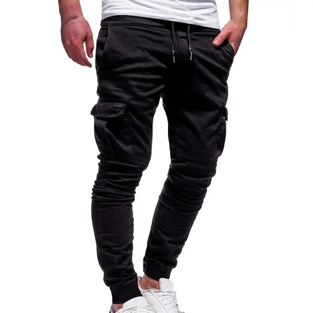 Men's black cargo jogger pants, front view on a model