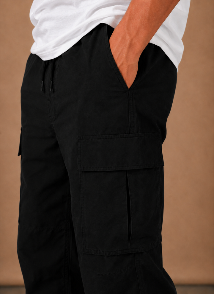 Close up of the black cargo pocket and side seam