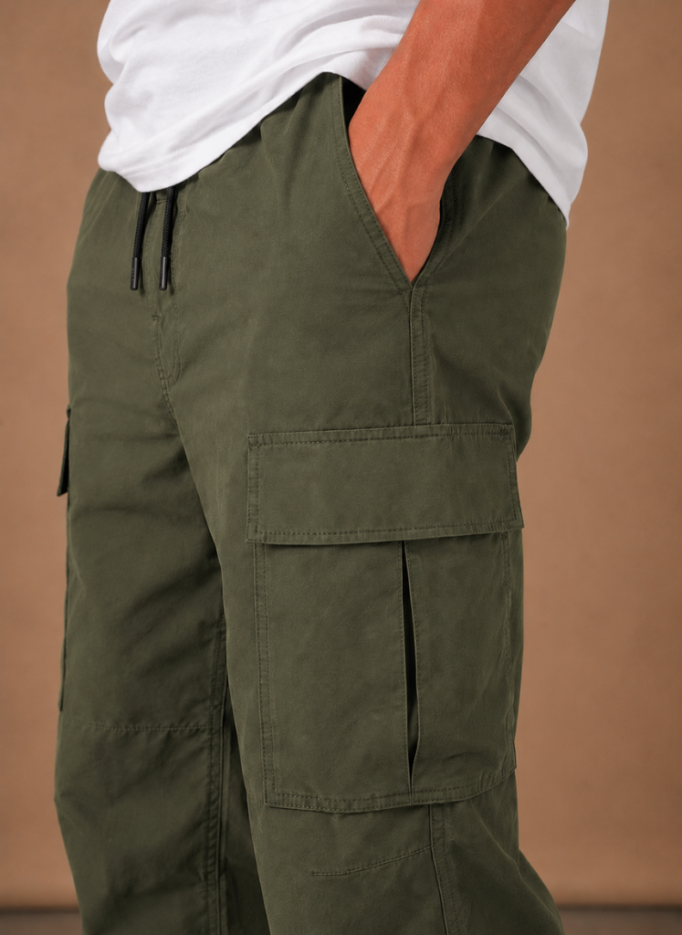 Close up of the olive flap pocket on the thigh