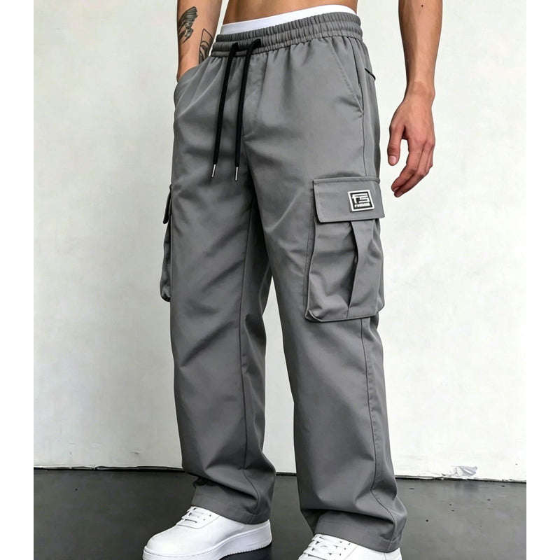 Dark Grey wide leg cargo pants styled with white sneakers