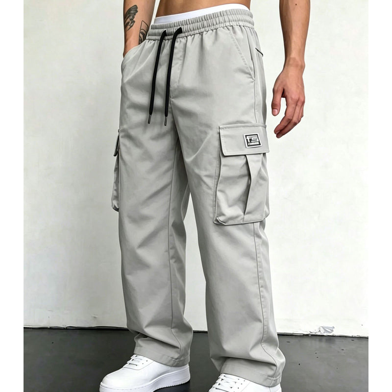 Light Grey wide leg cargo pants styled with white sneakers