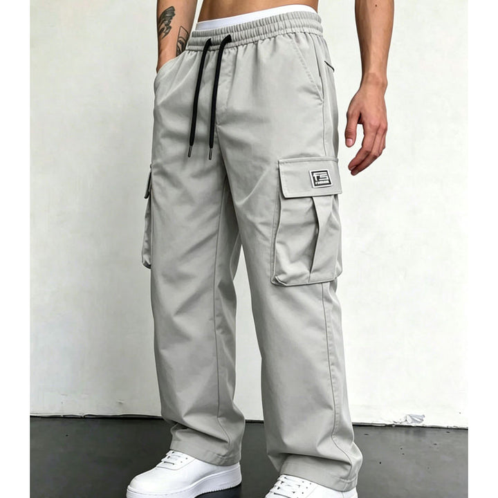 Light Grey wide leg cargo pants styled with white sneakers
