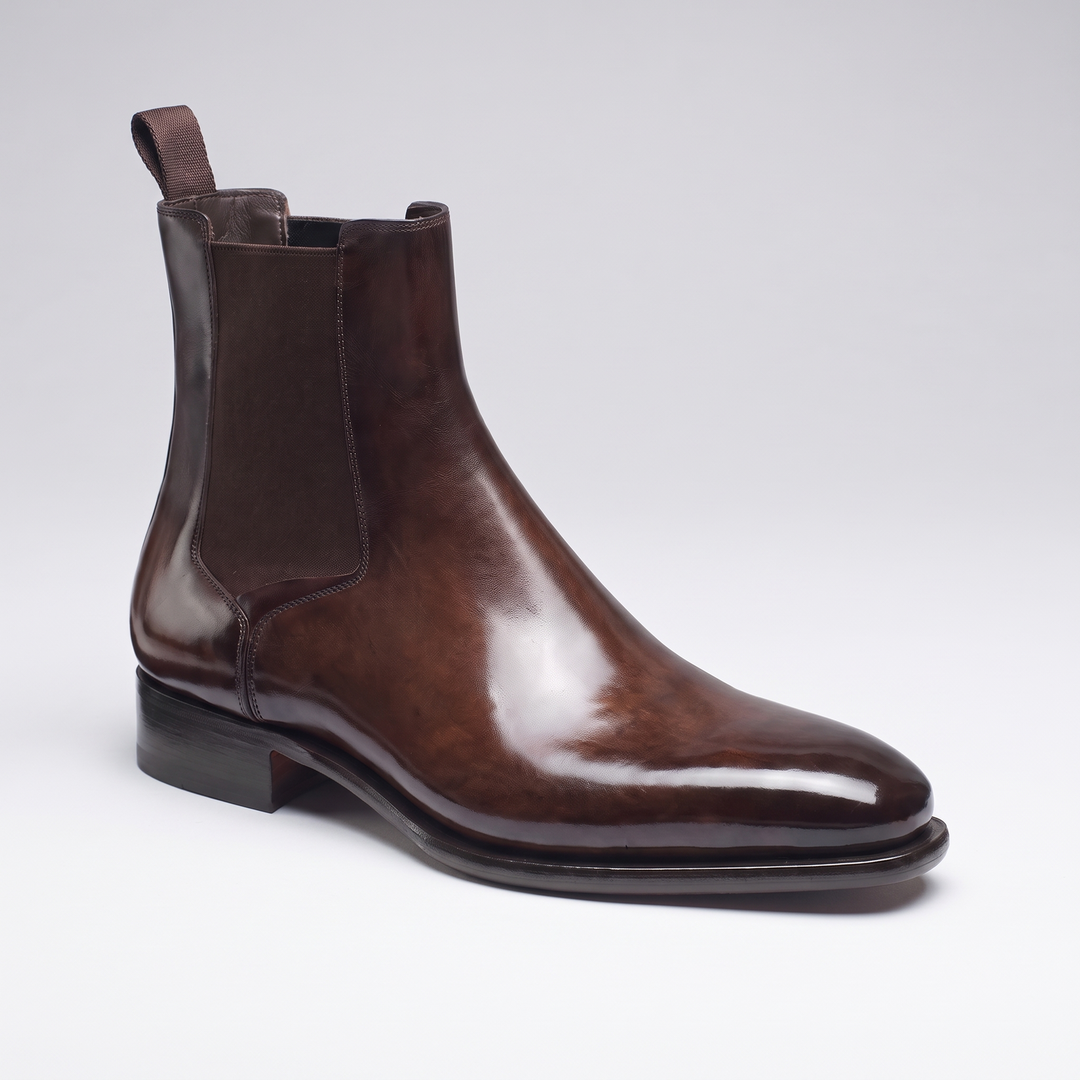 Dark brown chelsea boot side view with burnished polished finish