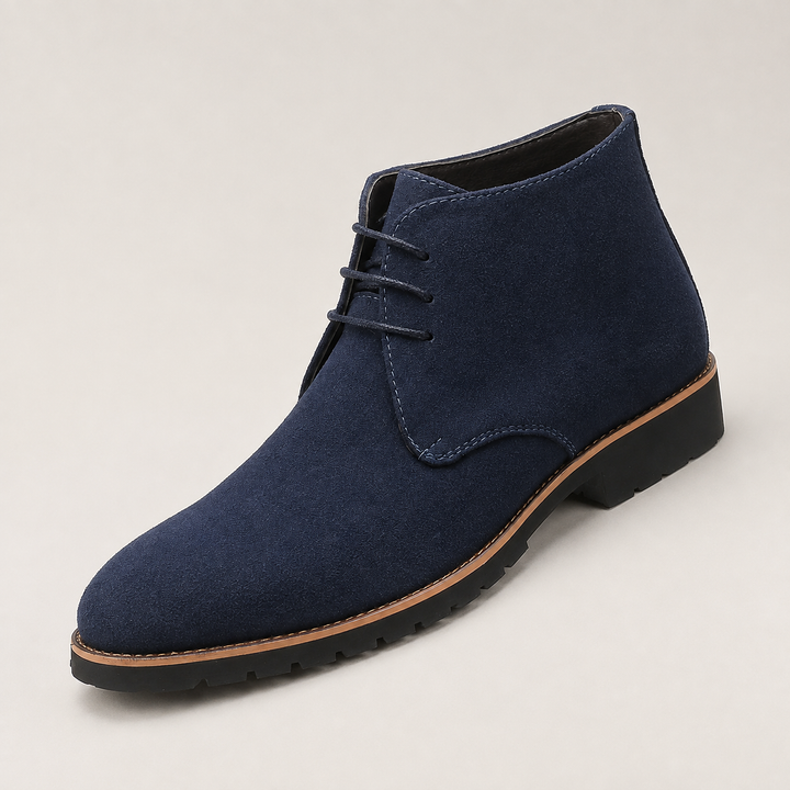 Navy lace up chukka boot with contrast welt and chunky lug sole