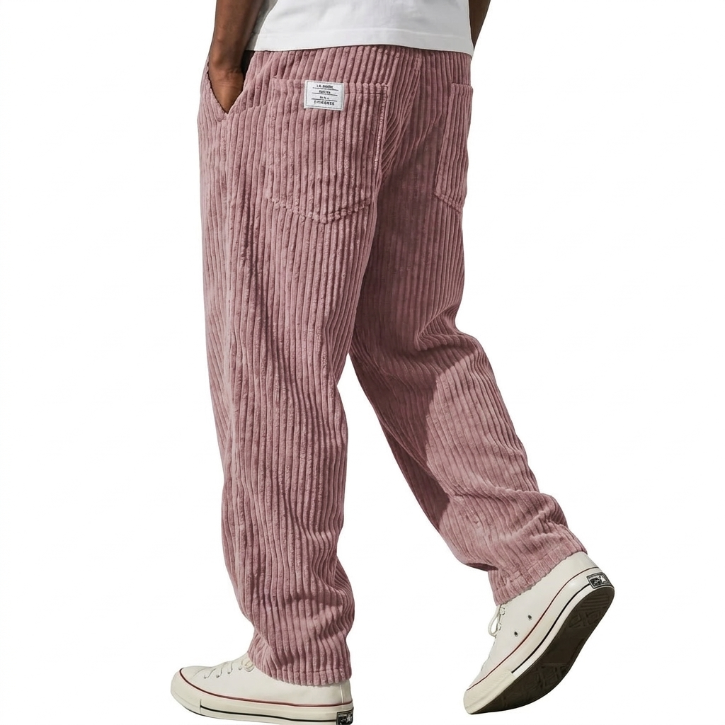 Pink corduroy pants with elastic waist, side view mid stride