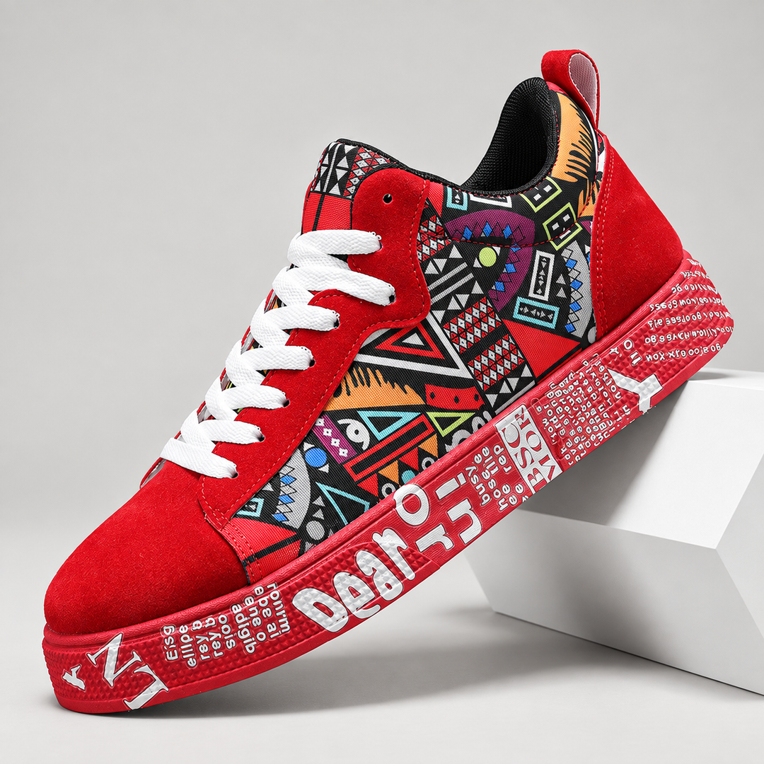 Red court sneakers with bold graphic print and white laces, side view