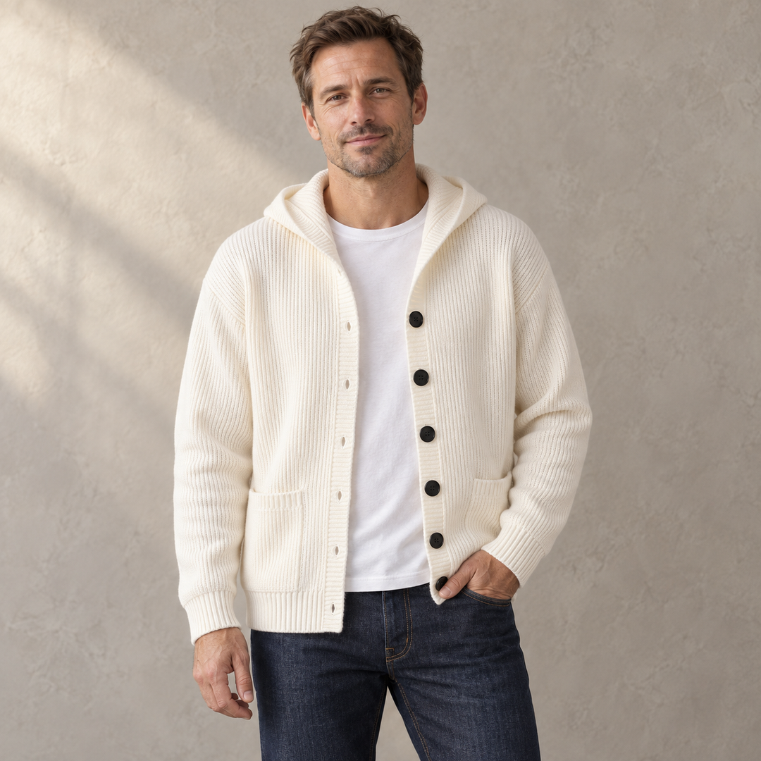 Ivory hooded cardigan worn open over a white tee with dark jeans