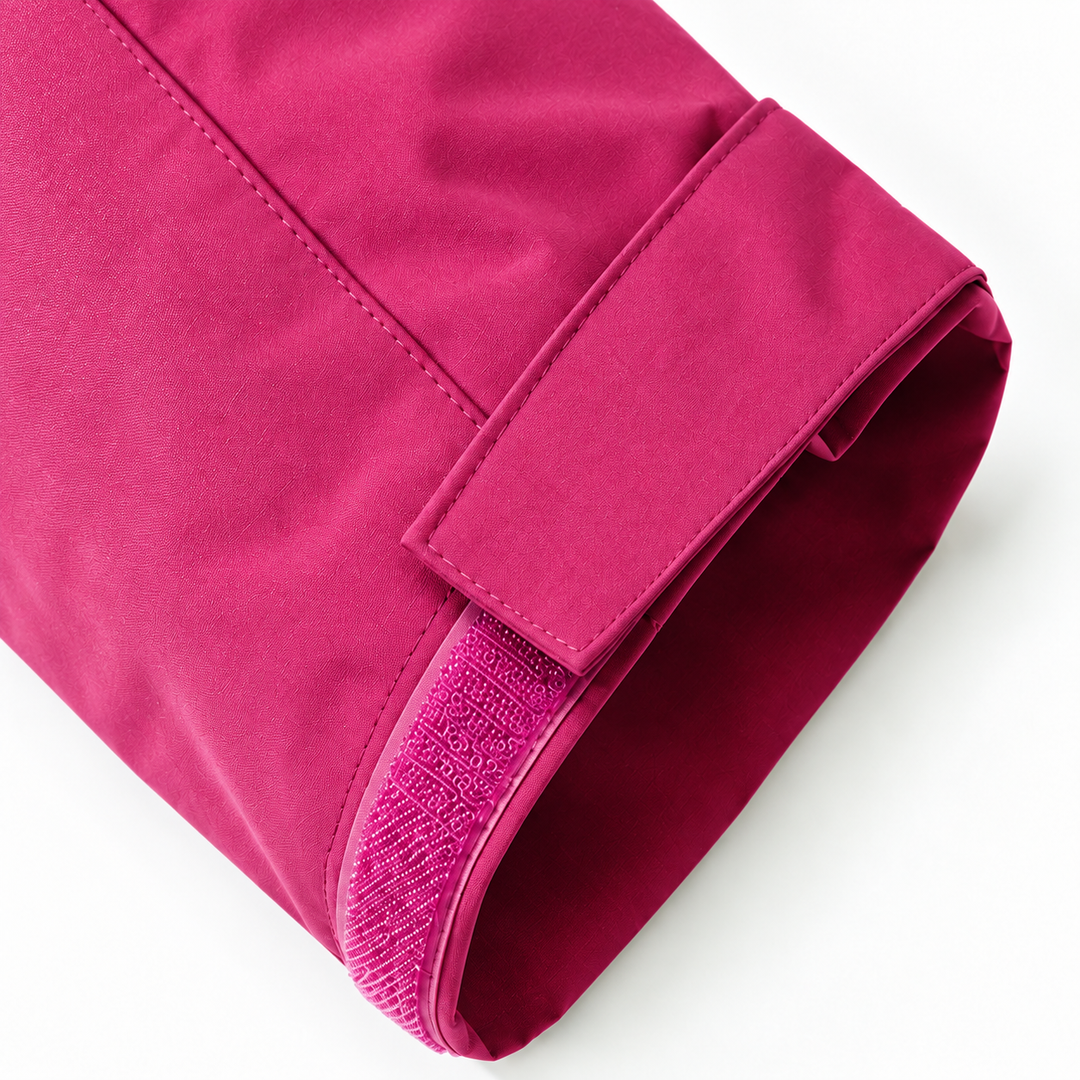 Close-up of the jacket cuff with adjustable tab and lining