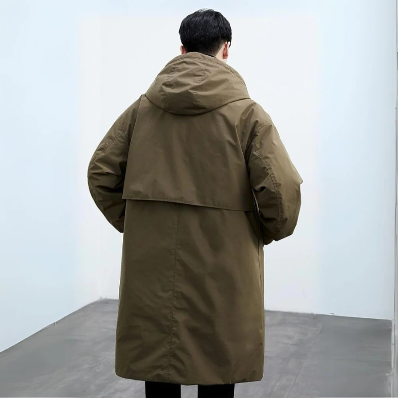 Back view of the olive long parka with hood and storm flap