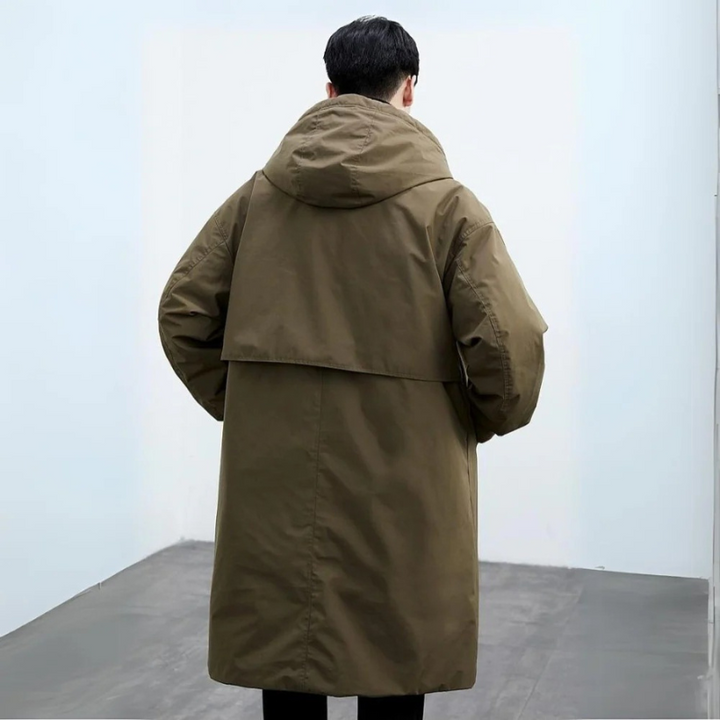Back view of the olive long parka with hood and storm flap
