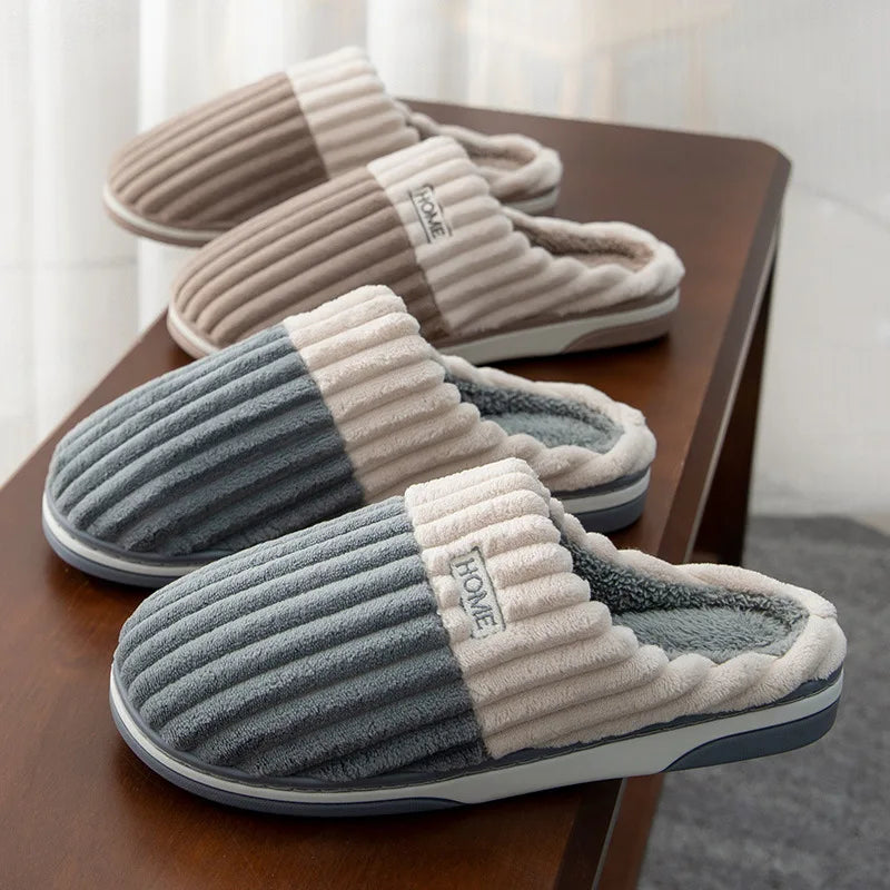 Taupe and slate gray ribbed slippers on a wooden bench