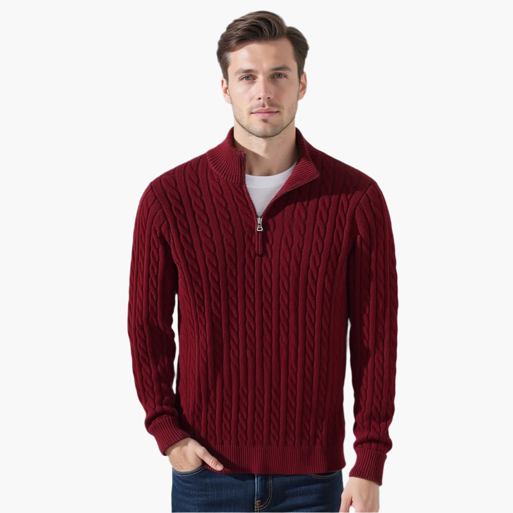 Man wearing a burgundy cable knit quarter zip pullover, front view