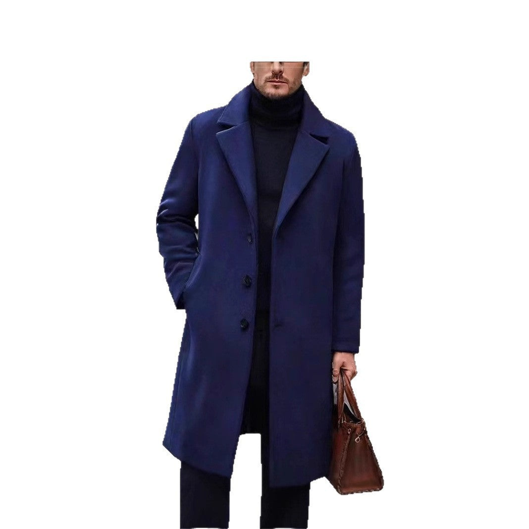 Navy single breasted overcoat on a white background
