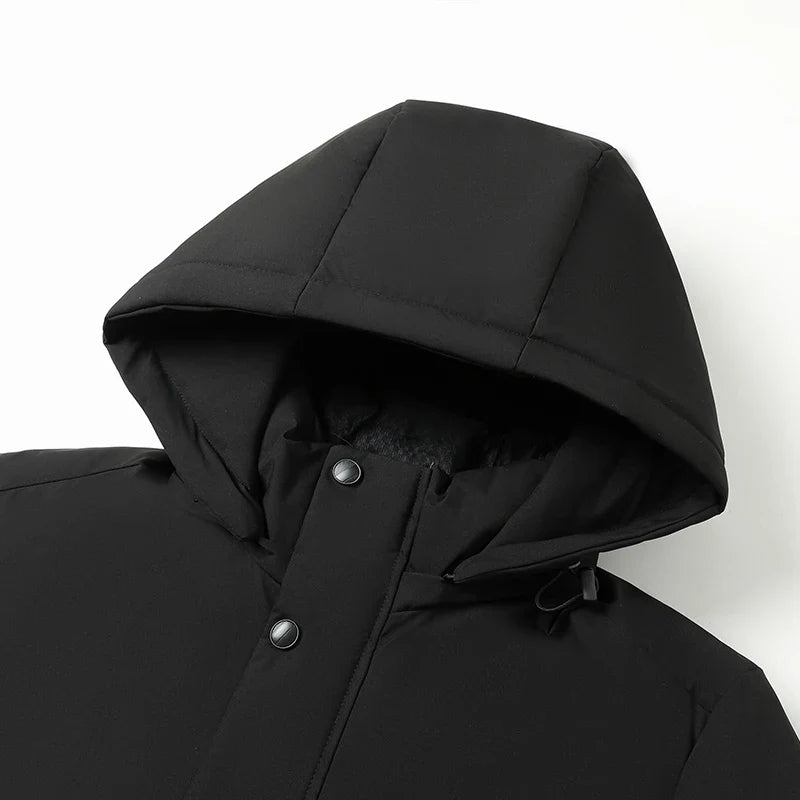 Close up of the black parka hood with snap buttons and padded body