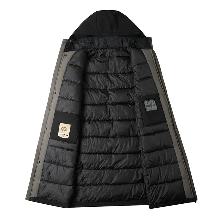 Black parka laid flat and open showing the quilted inner lining