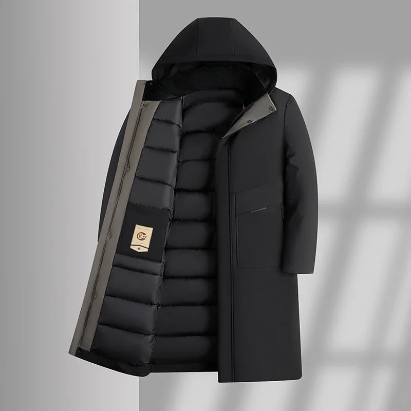 Black long parka opened to show the quilted inner lining and label