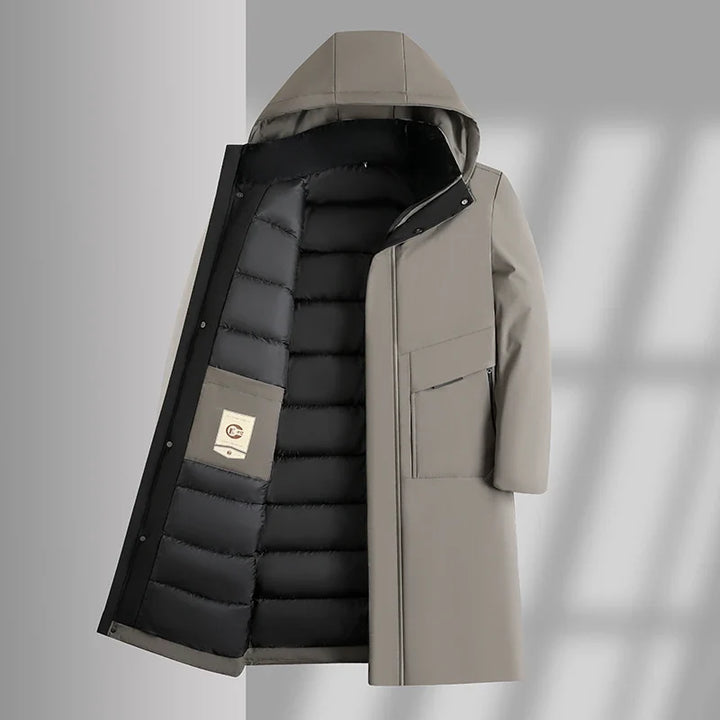 Stone long parka opened to show the quilted inner lining and label