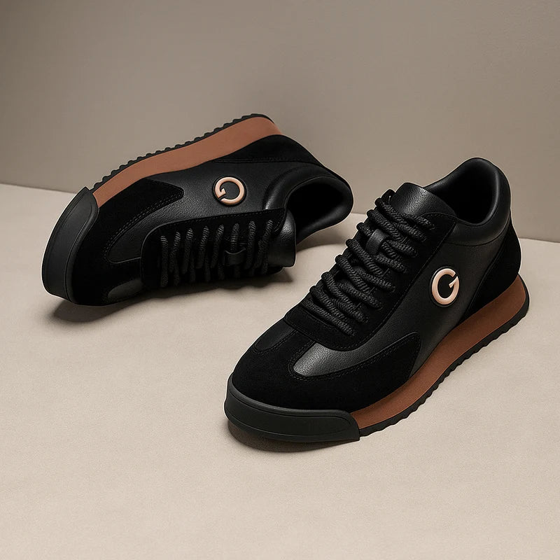 Black retro sneakers with caramel sole and side emblem, low angle view