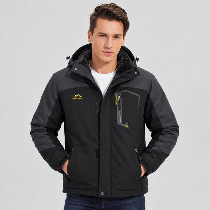 Man wearing the charcoal winter jacket over a white tee