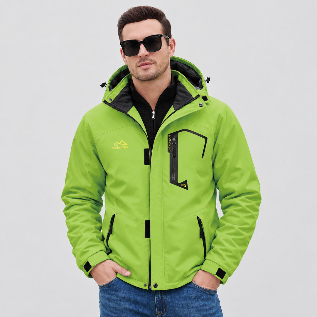 Man in sunglasses wearing the lime green snow jacket