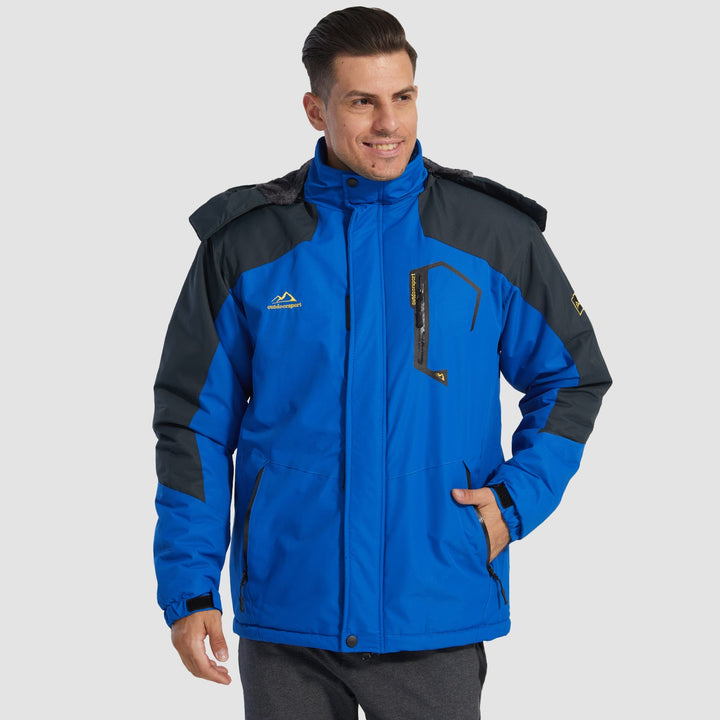 Smiling man wearing the royal blue snow jacket