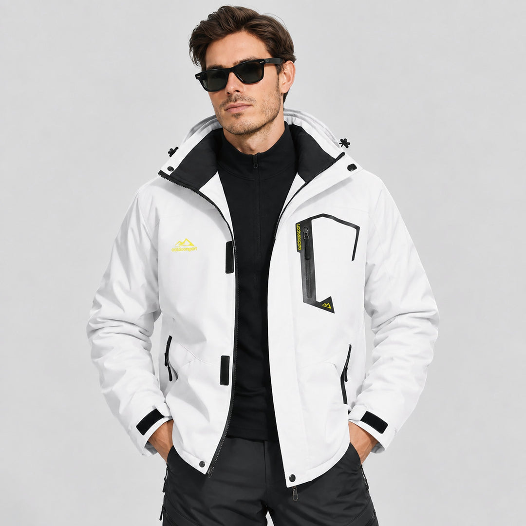 Man in sunglasses wearing the white ski jacket