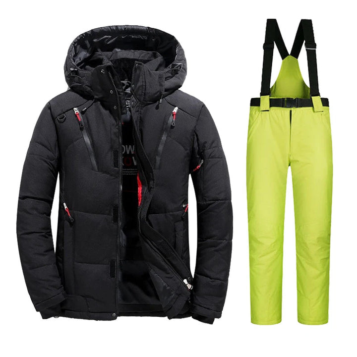 Black ski jacket paired with lime green snow bib pants