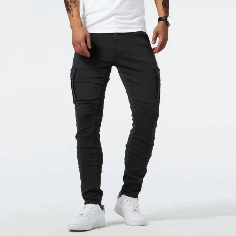 Black slim cargo pants worn with a white tee and sneakers