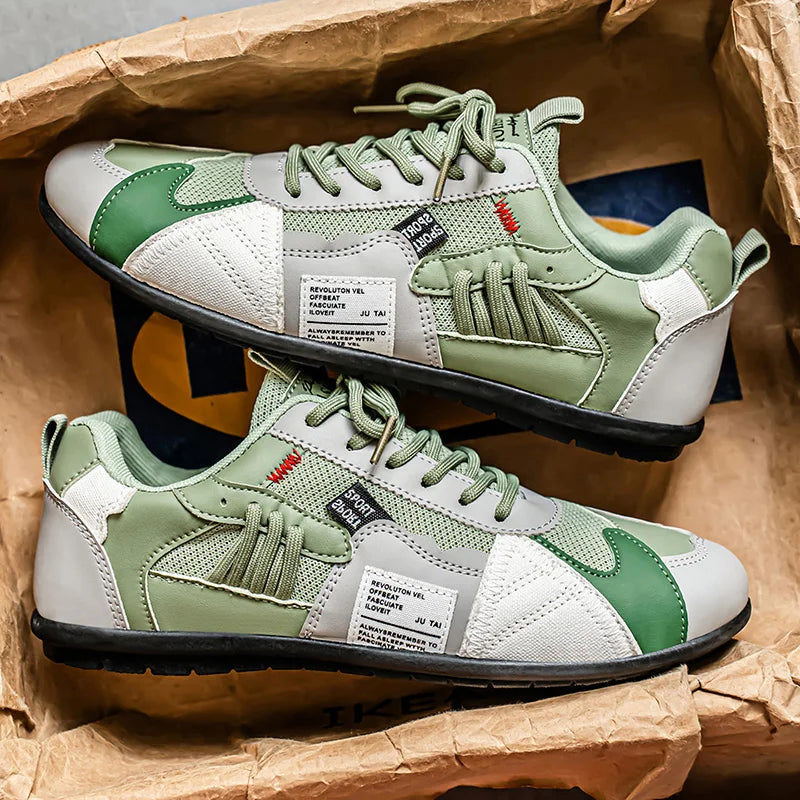 Green color block low top sneakers with white panels, top and side view