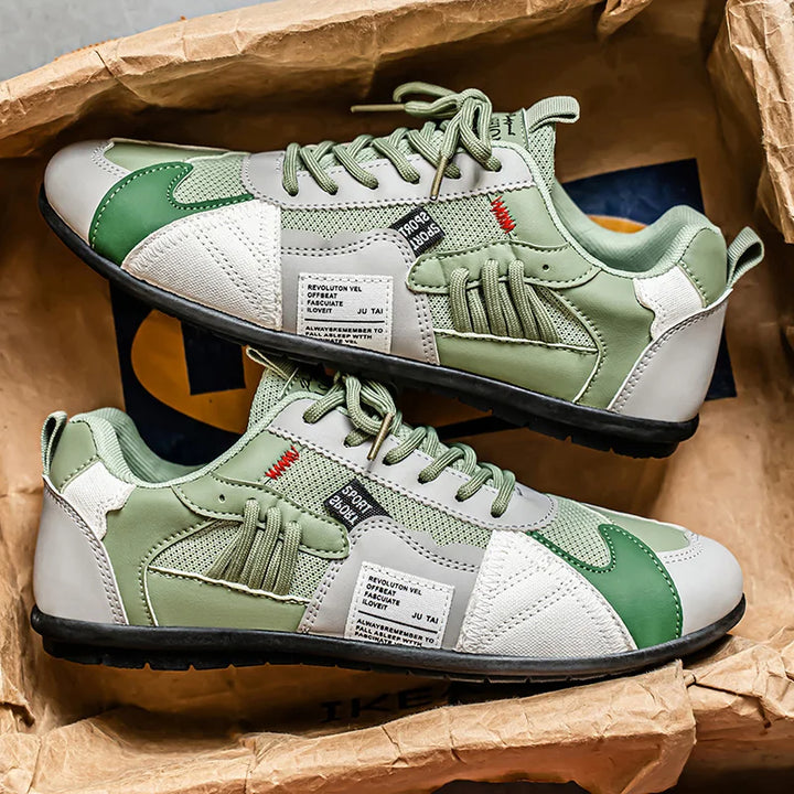 Green color block low top sneakers with white panels, top and side view
