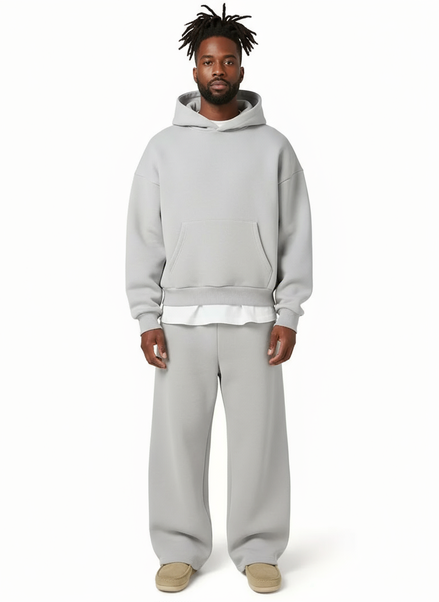 Men's light gray hoodie and sweatpants sweatsuit, front view on a model