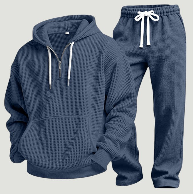 Navy half zip hoodie with white drawcords and matching joggers
