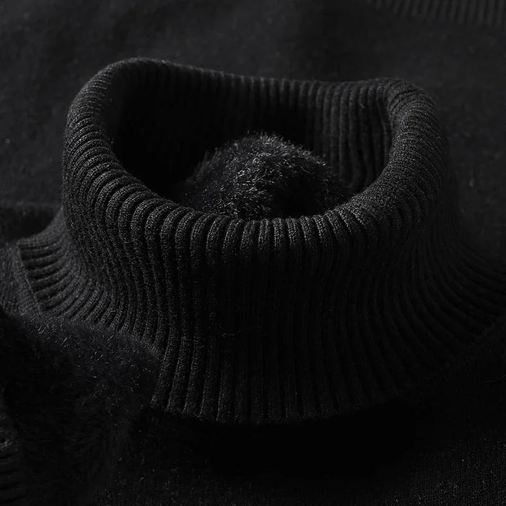Close-up of the black ribbed turtleneck collar with fleece lining