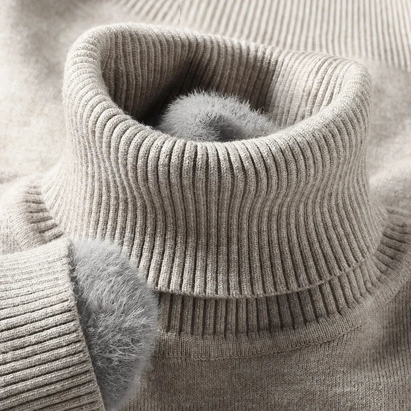 Close-up of the gray ribbed turtleneck collar with fleece lining